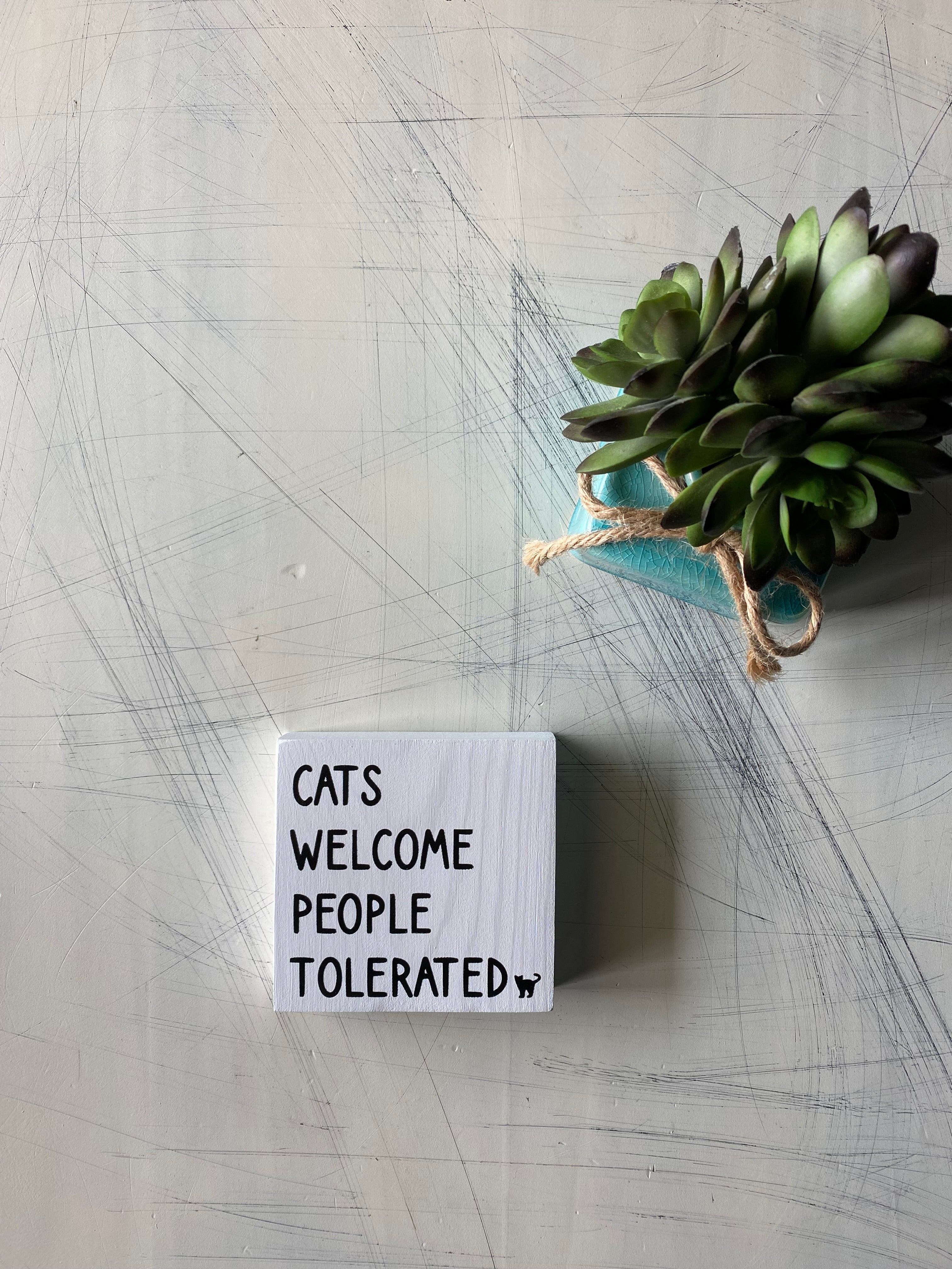 Cats welcome people tolerated