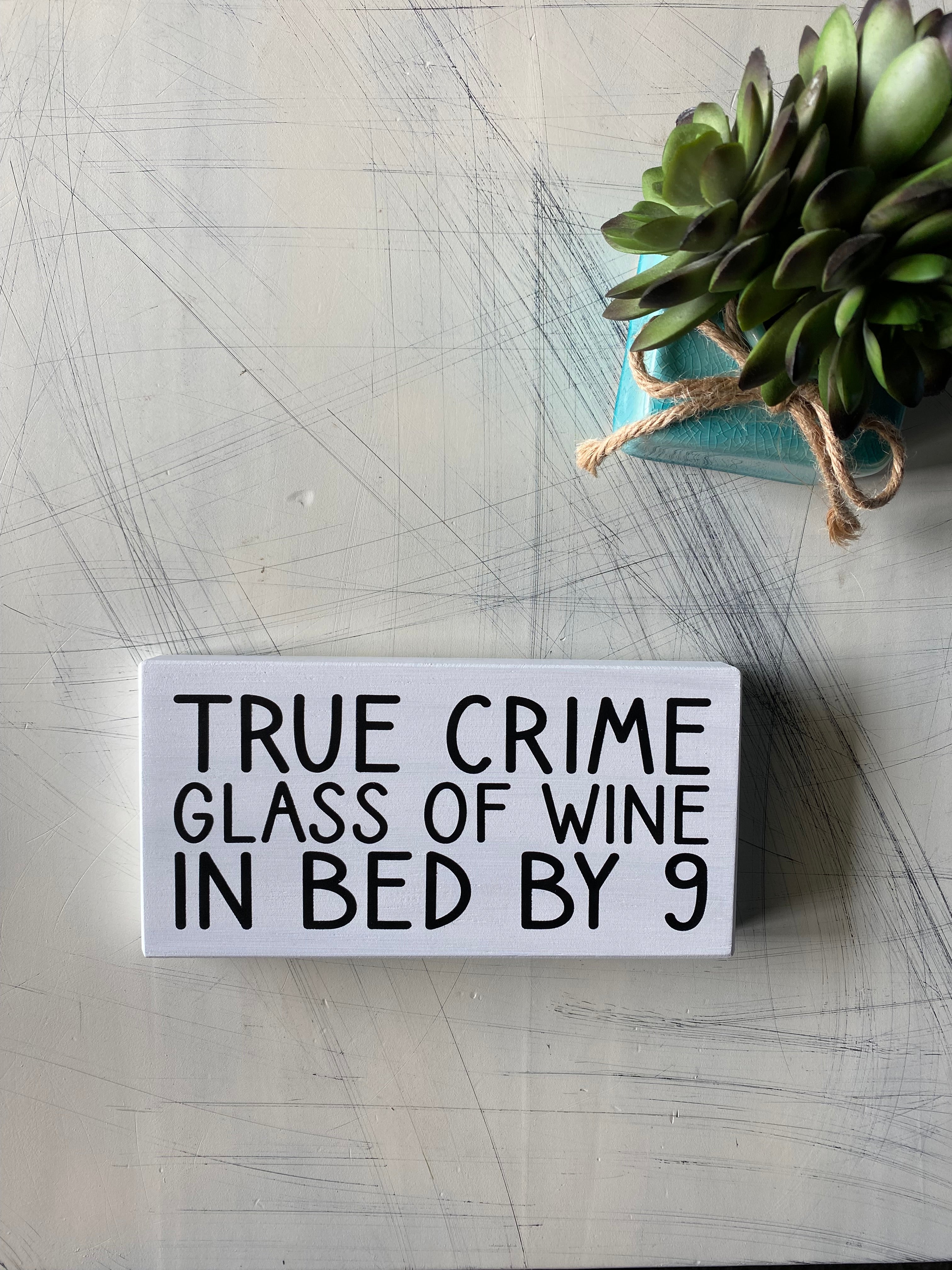 True crime glass of wine in bed by 9