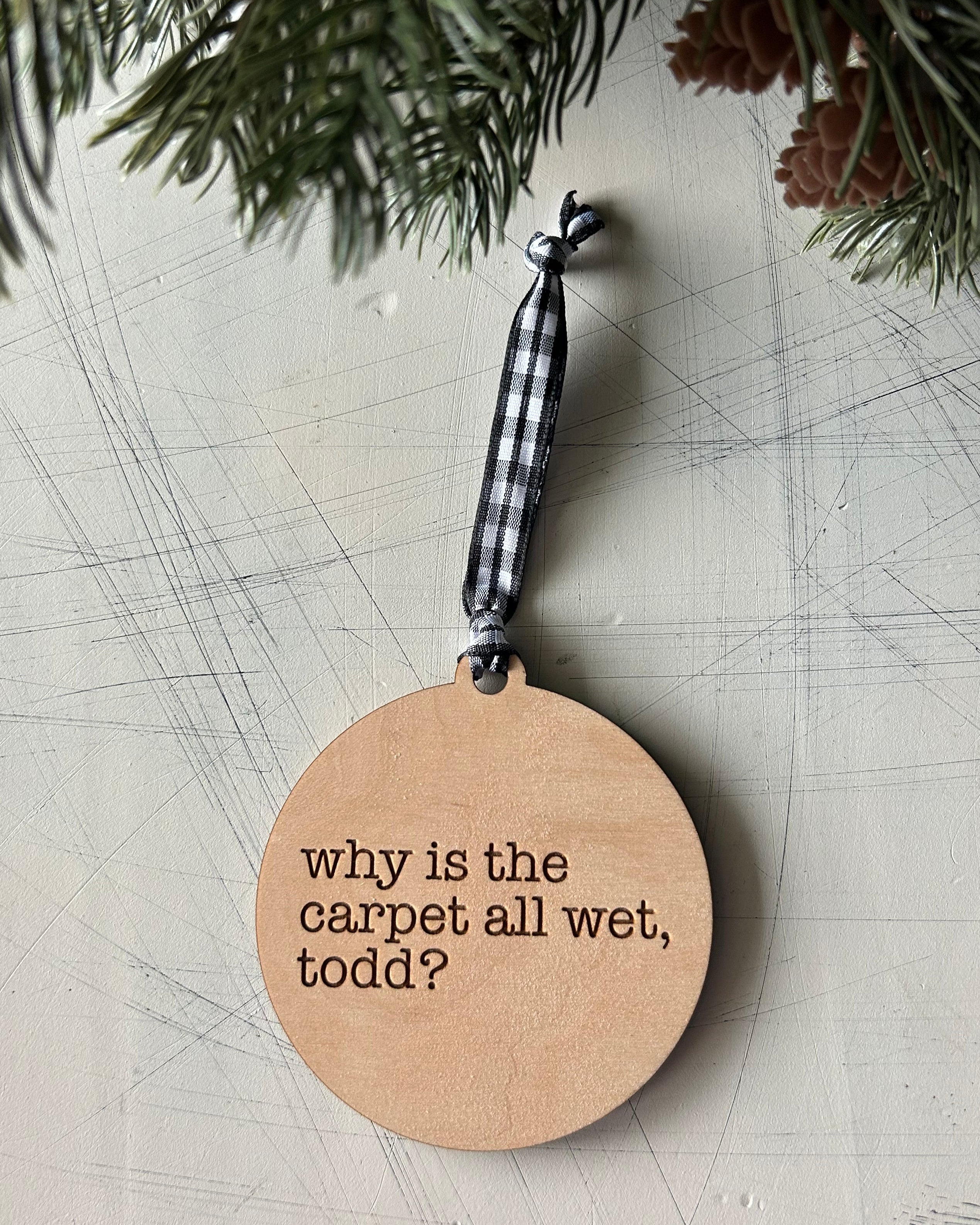 Why is the carpet all wet, Todd? I don’t know, Margo! - 3 inch double sided ornament