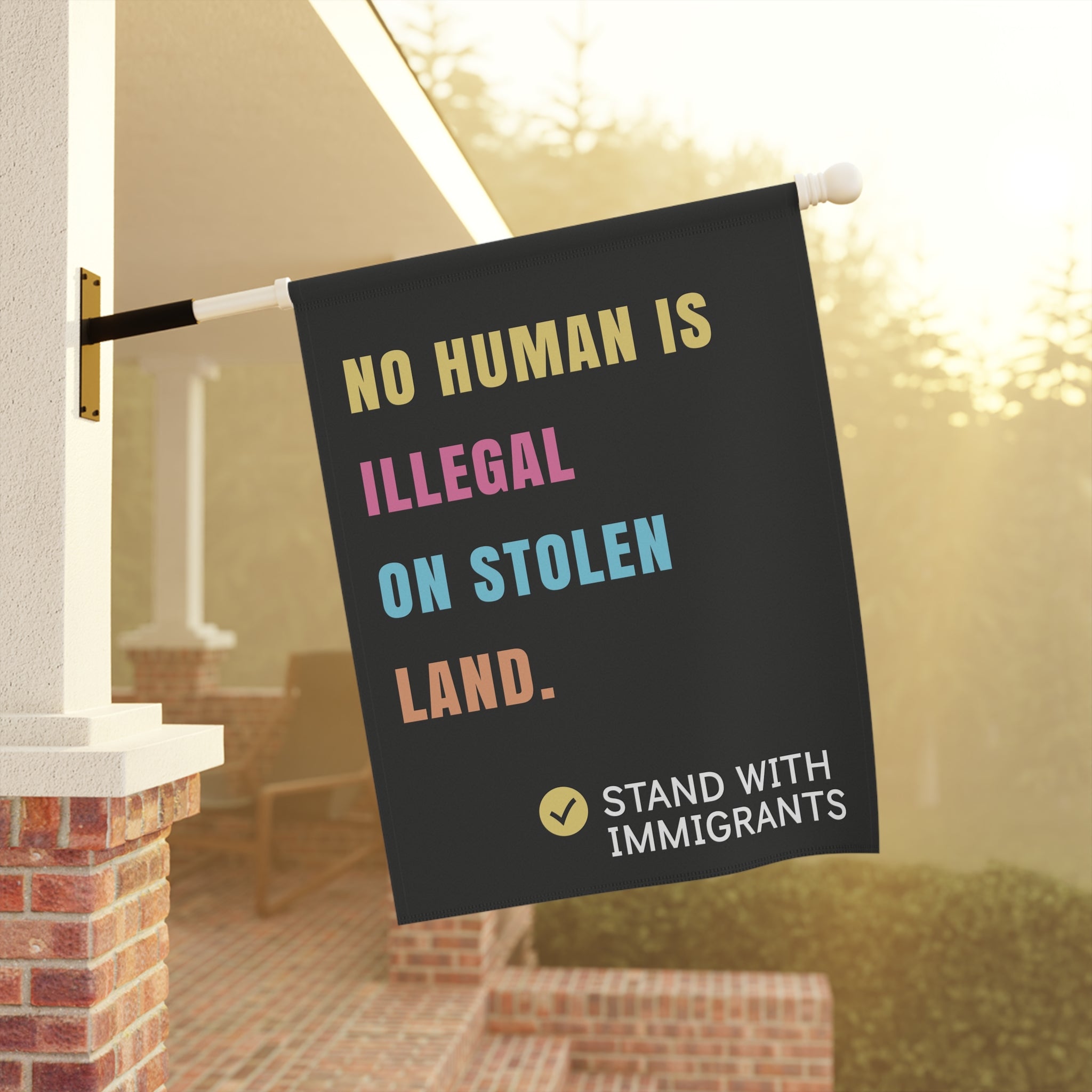 No Human is Illegal on Stolen Land Garden Flag