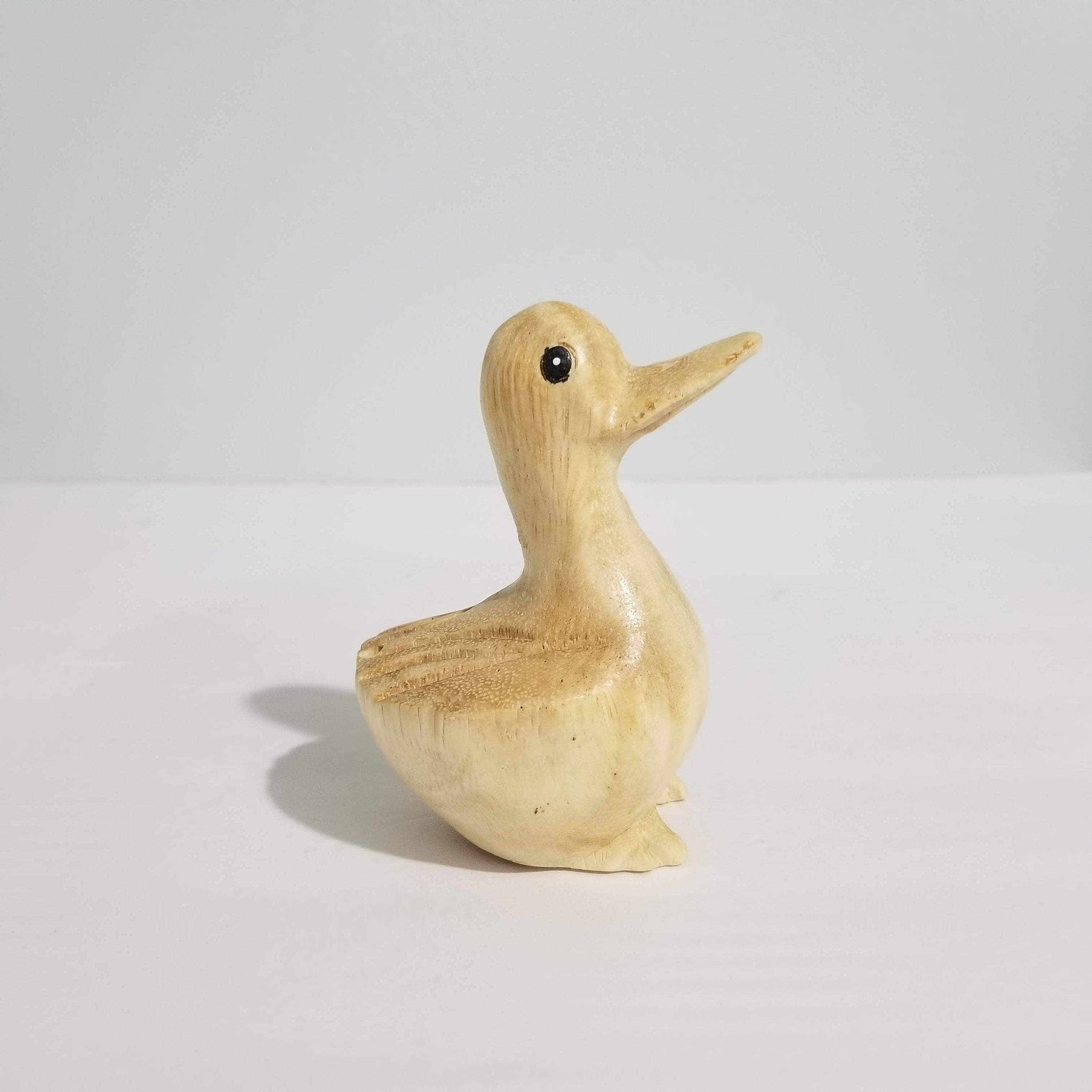 Wooden whistle duck